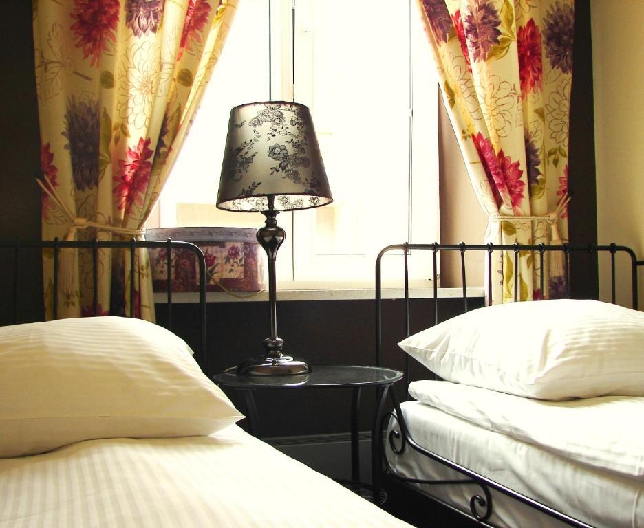 Chmielna Guest House ワルシャワ 部屋 写真